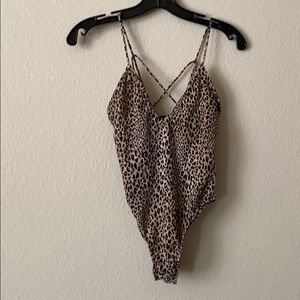 Cheetah bodysuit with open back design